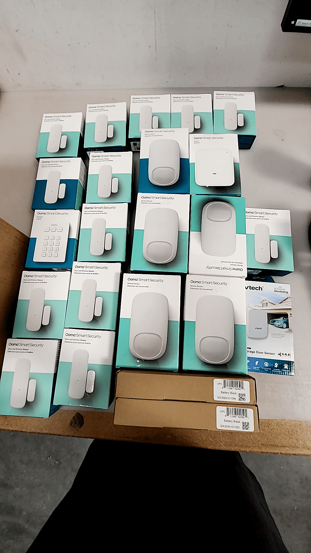 Complete Ooma Smart Home Security System kit featuring door, window, and motion sensors in mint condition.
