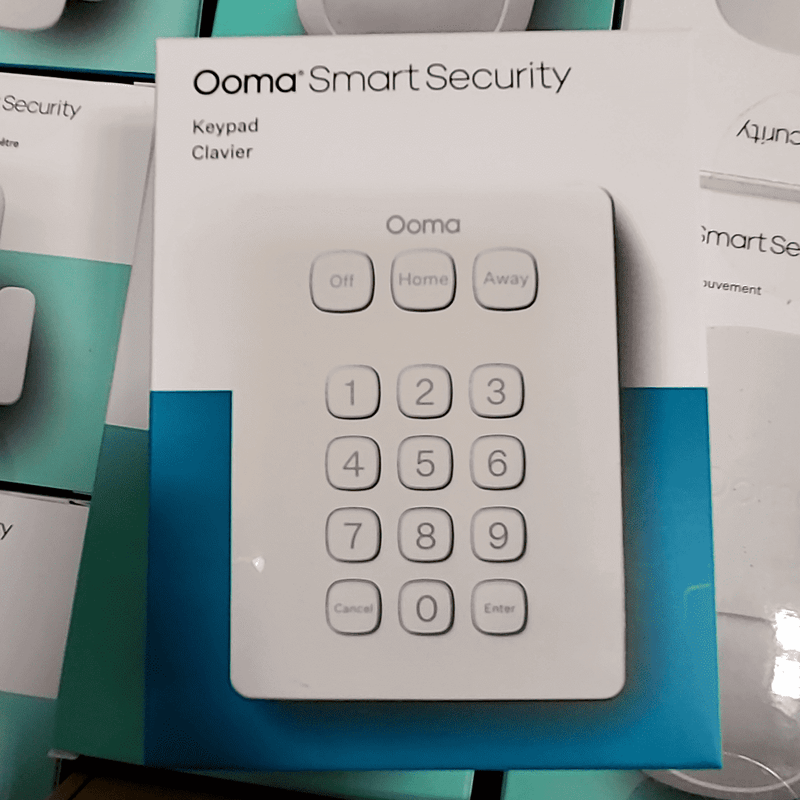 Ooma Smart Security keypad featuring controls for Off, Home, and Away settings, in mint condition.