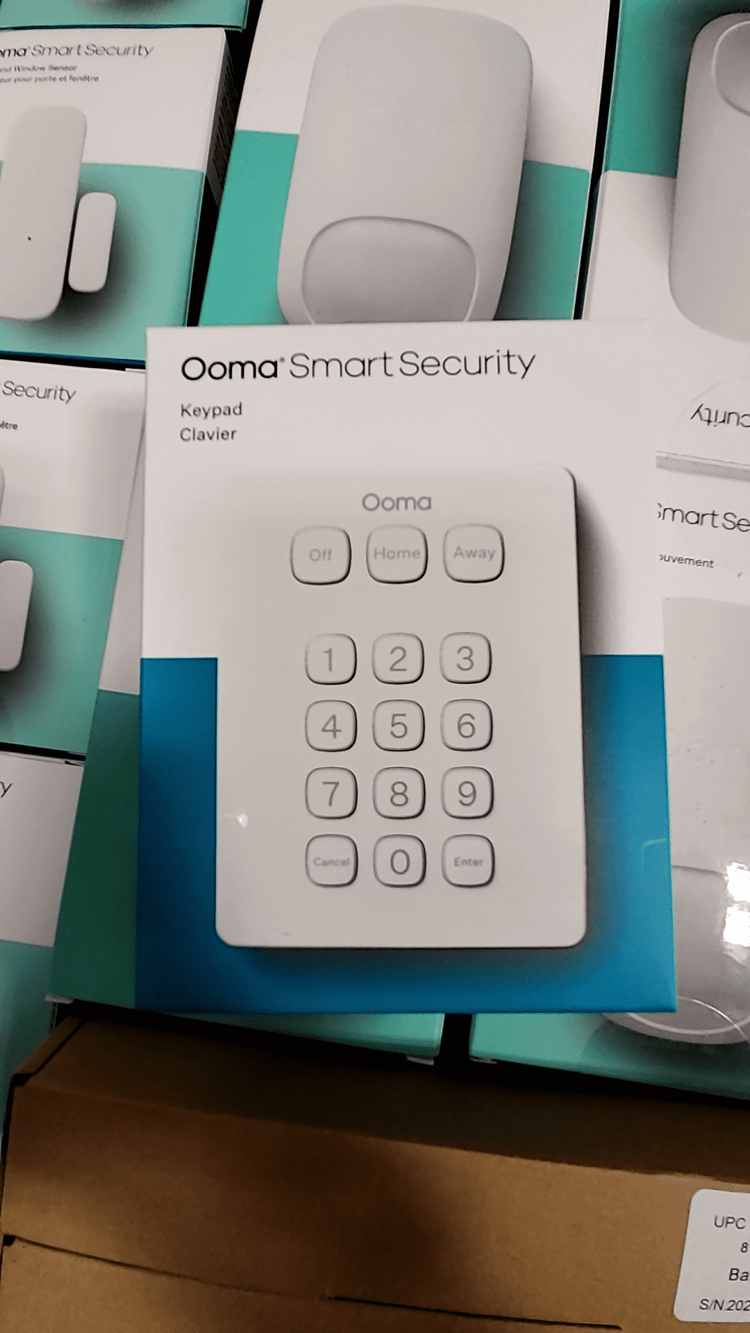 Ooma Smart Security keypad featuring controls for Off, Home, and Away settings, in mint condition.