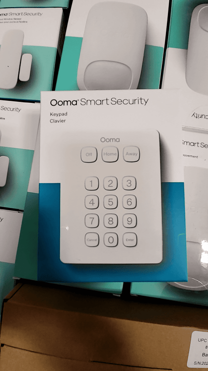 Ooma Smart Security keypad featuring controls for Off, Home, and Away settings, in mint condition.